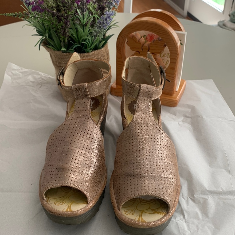 Fly London gold 2.5" peep toe heel sandals.